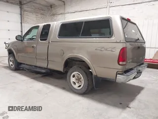 2001 Ford F-150 XL z VIN 1FTRX18W91NB49304, wystawiony jako IAAI lot #42316935 z przebiegiem 258 410 mil mil oraz . Historia ofert i sprzedaży dostępna na DreamBid. Obrazek 3.