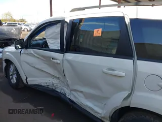 2014 Dodge Journey SXT with VIN 3C4PDCBGXET122969, listed as a IAAI auction lot 41741679 with 151,285 mi miles. Bid and sale history available at carsss.com. Image 6.