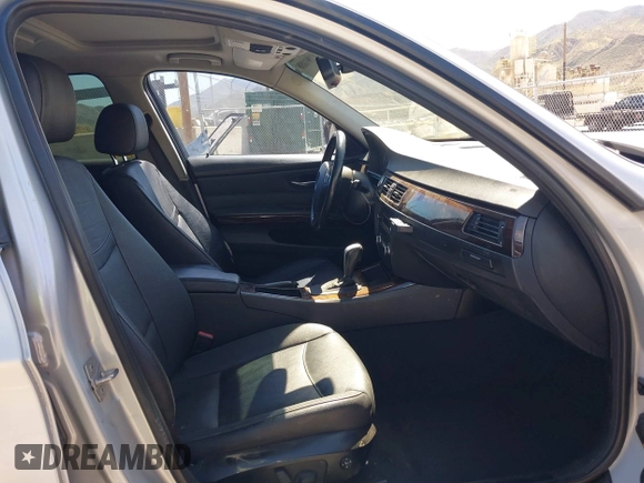 2011 BMW 3 Series 328i with VIN WBAPH5G51BNM77903, listed as a IAAI auction lot 42001088 with 126,012 mi miles and . Bid and sale history available at DreamBid. Image 5.