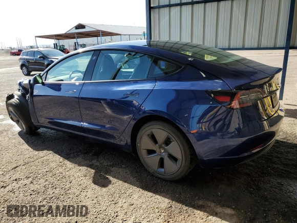 2022 Tesla Model 3 with VIN 5YJ3E1EA9NF288499, listed as a Copart auction lot 52202955 with 86,372 mi miles and Clean Title. Bid and sale history available at DreamBid. Image 2.