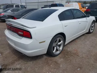 2013 Dodge Charger SXT Plus with VIN 2C3CDXHG8DH614862, listed as a IAAI auction lot 41874630 with 156,213 mi miles. Bid and sale history available at carsss.com. Image 4.