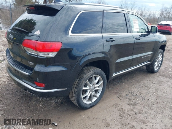 2015 Jeep Grand Cherokee Summit with VIN 1C4RJFJGXFC882787, listed as a IAAI auction lot 42098274 with 147,020 mi miles and . Bid and sale history available at DreamBid. Image 4.