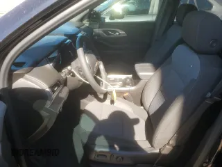 2023 Chevrolet Traverse LT Cloth with VIN 1GNERGKW7PJ272577, listed as a Copart auction lot 57145305 with 7,190 mi miles and Salvage title. Bid and sale history available at DreamBid. Image 7.