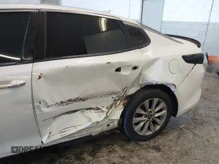 2016 Kia Optima SX Turbo with VIN 5XXGW4L23GG016526, listed as a IAAI auction lot 41428139 with 112,603 mi miles and . Bid and sale history available at carsss.com. Image 6.