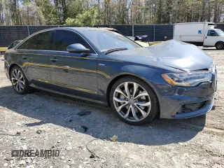 2014 Audi A6 Prestige z VIN WAUHGAFCXEN115962, wystawiony jako Copart lot #52228395 z przebiegiem 134 622 mil mil oraz Szkoda całkowita • Salvage title. Historia ofert i sprzedaży dostępna na DreamBid. Obrazek 4.