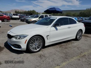 2014 BMW 4 Series 428i with VIN WBA3V7C51EJ873074, listed as a Copart auction lot 58778785 with 94,007 mi miles and Salvage title. Bid and sale history available at DreamBid. Image 1.