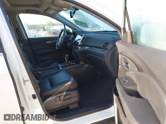 2017 Honda Pilot EX-L with VIN 5FNYF6H54HB015814, listed as a IAAI auction lot 41955743 with 122,389 mi miles and . Bid and sale history available at DreamBid. Image 5.