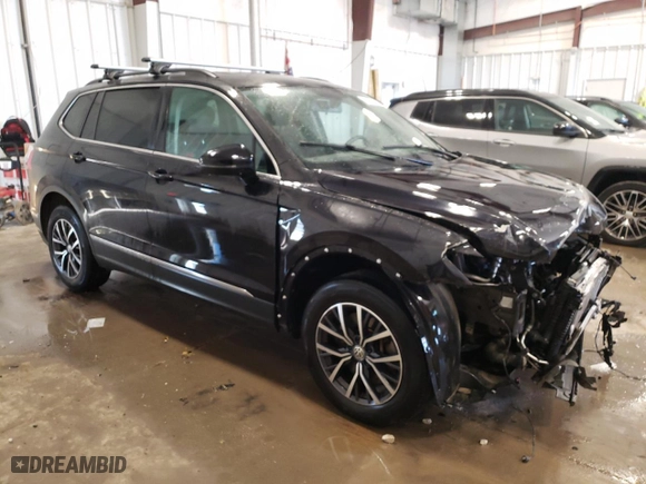 2020 Volkswagen Tiguan SE with VIN 3VV2B7AX2LM087281, listed as a Copart auction lot 41977395 with 106,122 mi miles and Salvage Title. Bid and sale history available at carsss.com. Image 4.