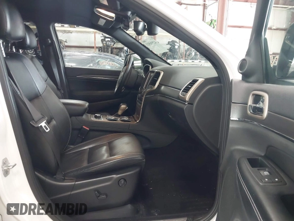 2016 Jeep Grand Cherokee Limited with VIN 1C4RJFBG2GC490483, listed as a IAAI auction lot 42596513 with 113,937 mi miles and . Bid and sale history available at DreamBid. Image 5.