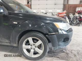 2007 Mitsubishi Outlander XLS z VIN JA4MT41X87Z001991, wystawiony jako IAAI lot #42200951 z przebiegiem 202 866 mil mil oraz . Historia ofert i sprzedaży dostępna na DreamBid. Obrazek 6.