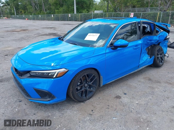 2023 Honda Civic Sport Touring z VIN 19XFL1H84PE002868, wystawiony jako IAAI lot #41978174 z przebiegiem 42 604 mil mil oraz . Historia ofert i sprzedaży dostępna na DreamBid. Obrazek 2.