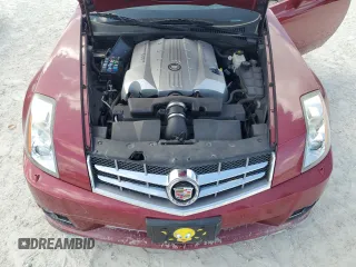 2009 Cadillac XLR Platinum z VIN 1G6YV36A595600621, wystawiony jako Copart lot #75302454 z przebiegiem Nie podano mil oraz Szkody całkowita. Historia ofert i sprzedaży dostępna na DreamBid. Obrazek 11.