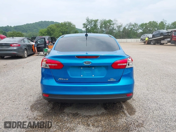 2015 Ford Focus SE z VIN 1FADP3F21FL274182, wystawiony jako IAAI lot #42441161 z przebiegiem 176 810 mil mil oraz . Historia ofert i sprzedaży dostępna na DreamBid. Obrazek 17.