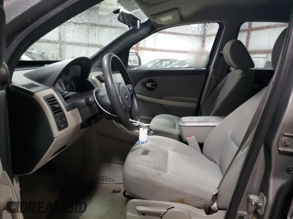 2005 Chevrolet Equinox LS z VIN 2CNDL23F156030624, wystawiony jako Copart lot #56640115 z przebiegiem 198 222 mil mil oraz Szkoda całkowita • Salvage title. Historia ofert i sprzedaży dostępna na DreamBid. Obrazek 7.