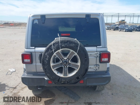 2018 Jeep Wrangler Unlimited Sahara with VIN 1C4HJXEG4JW115522, listed as a IAAI auction lot 42322791 with 68,409 mi miles and . Bid and sale history available at DreamBid. Image 16.