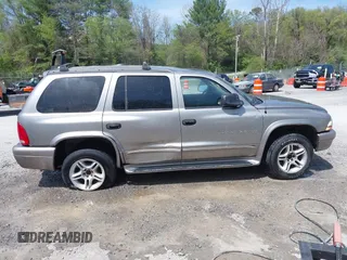 2001 Dodge Durango z VIN 1B4HS28Z71F586249, wystawiony jako IAAI lot #42102007 z przebiegiem 211 850 mil mil oraz . Historia ofert i sprzedaży dostępna na DreamBid. Obrazek 13.