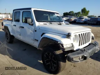 2023 Jeep Gladiator Sport S with VIN 1C6HJTAG4PL528847, listed as a Copart auction lot 64470375 with 36,177 mi miles and Salvage title. Bid and sale history available at DreamBid. Image 4.