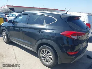 2017 Hyundai Tucson Value with VIN KM8J33A28HU302472, listed as a IAAI auction lot 41717598 with 126,438 mi miles. Bid and sale history available at carsss.com. Image 3.