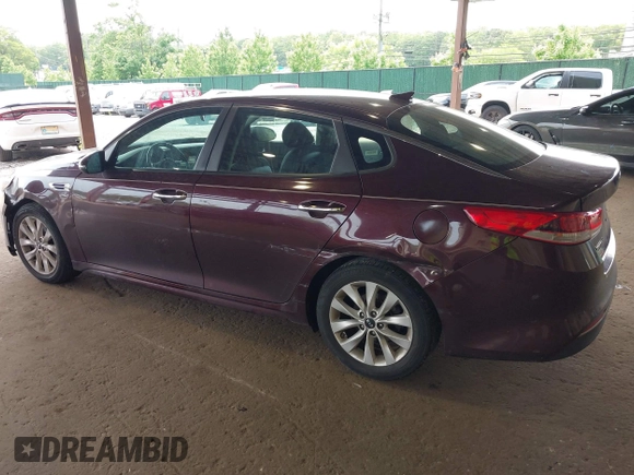 2016 Kia Optima LX with VIN 5XXGT4L32GG021055, listed as a IAAI auction lot 42424285 with 285,318 mi miles and . Bid and sale history available at DreamBid. Image 3.