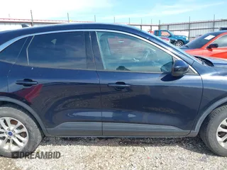 2021 Ford Escape SE z VIN 1FMCU9G67MUA39792, wystawiony jako IAAI lot #42091121 z przebiegiem 135 920 mil mil oraz . Historia ofert i sprzedaży dostępna na DreamBid. Obrazek 13.