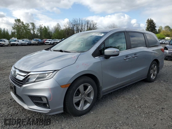 2018 Honda Odyssey EX-L z VIN 5FNRL6H72JB099281, wystawiony jako Copart lot #53515425 z przebiegiem 137 493 mil mil oraz Szkoda całkowita • Salvage title. Historia ofert i sprzedaży dostępna na DreamBid. Obrazek 1.