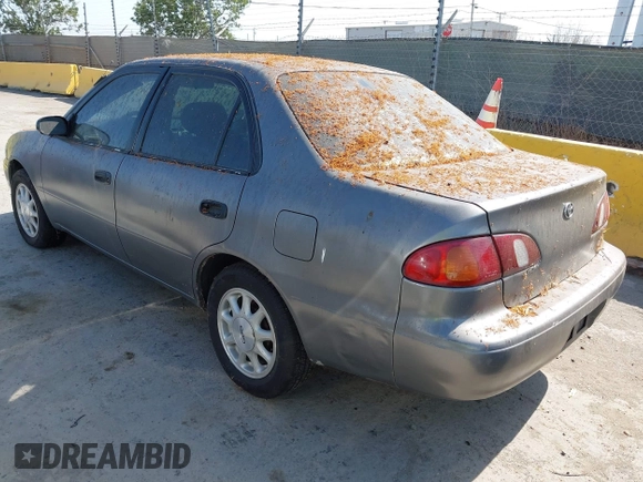 1999 Toyota Corolla VE z VIN 1NXBR12E5XZ237045, wystawiony jako IAAI lot #42413586 z przebiegiem Nie podano mil oraz . Historia ofert i sprzedaży dostępna na DreamBid. Obrazek 3.