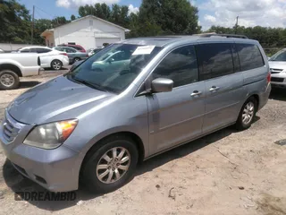 2010 Honda Odyssey EX-L z VIN 5FNRL3H74AB104446, wystawiony jako IAAI lot #42765331 z przebiegiem 319 510 mil mil oraz . Historia ofert i sprzedaży dostępna na DreamBid. Obrazek 2.