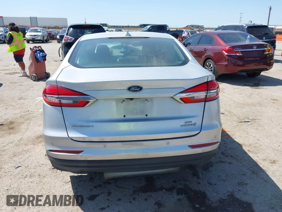 2019 Ford Fusion SE with VIN 3FA6P0LU1KR222141, listed as a IAAI auction lot 42000677 with 122,898 mi miles and . Bid and sale history available at carsss.com. Image 16.