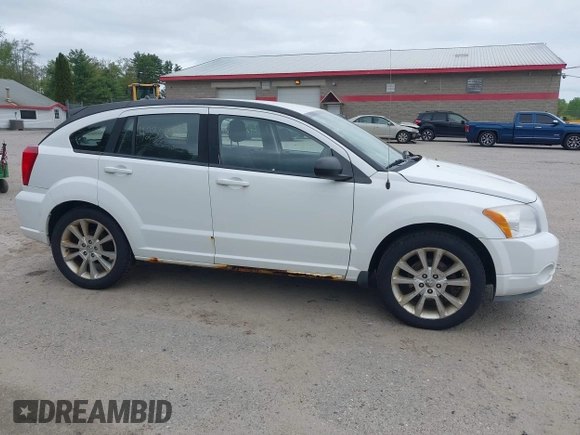 2011 Dodge Caliber Heat z VIN 1B3CB5HA5BD186441, wystawiony jako IAAI lot #42309221 z przebiegiem 166 026 mil mil oraz . Historia ofert i sprzedaży dostępna na DreamBid. Obrazek 14.