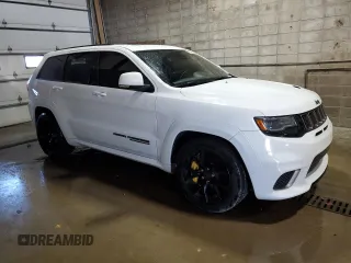 2020 Jeep Grand Cherokee Trackhawk with VIN 1C4RJFN97LC141522, listed as a Copart auction lot 80134014 with 53,494 mi miles and Salvage title. Bid and sale history available at DreamBid. Image 4.