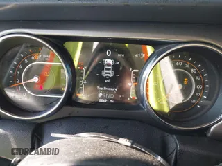 2019 Jeep Wrangler Unlimited Sahara with VIN 1C4HJXEN2KW591557, listed as a IAAI auction lot 41962034 with 88,691 mi miles and . Bid and sale history available at DreamBid. Image 7.