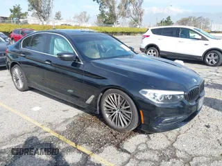 2018 BMW 5 Series 530i with VIN WBAJA5C56JG897692, listed as a IAAI auction lot 41813052 with 37,610 mi miles and . Bid and sale history available at DreamBid. Image 1.