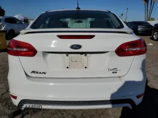 2016 Ford Focus SE with VIN 1FADP3F26GL336032, listed as a Copart auction lot 48334005 with 107,527 mi miles and Clean title. Bid and sale history available at DreamBid. Image 6.