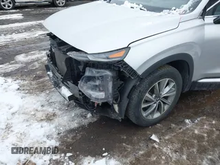 2019 Hyundai Santa Fe Ultimate with VIN 5NMS5CAD1KH000394, listed as a IAAI auction lot 41455421 with 42,886 mi miles and . Bid and sale history available at DreamBid. Image 19.