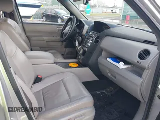 2013 Honda Pilot EX-L with VIN 5FNYF3H76DB013332, listed as a IAAI auction lot 41193240 with 121,308 mi miles and . Bid and sale history available at DreamBid. Image 5.