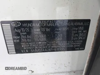 2023 Hyundai Santa Fe SEL with VIN 5NMS34AJ4PH618995, listed as a IAAI auction lot 41727294 with 23,332 mi miles and . Bid and sale history available at DreamBid. Image 9.