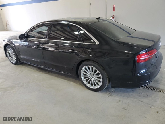 2016 Audi A8 L 4.0T Sport with VIN WAU43AFD1GN011589, listed as a Copart auction lot 86614934 with 96,137 mi miles and Salvage Title. Bid and sale history available at carsss.com. Image 2.