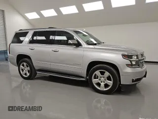 2016 Chevrolet Tahoe LTZ z VIN 1GNSCCKC4GR249391, wystawiony jako Copart lot #53579185 z przebiegiem 141 270 mil mil oraz Czysty tytuł • Clean title. Historia ofert i sprzedaży dostępna na DreamBid. Obrazek 4.
