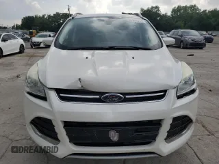 2014 Ford Escape Titanium с VIN 1FMCU0J97EUB15513, выставлен на аукционе Copart как лот 57391715 с пробегом 125 851 миль миль и Списание • Salvage title. История ставок и продаж доступна на DreamBid. Изображение 5.