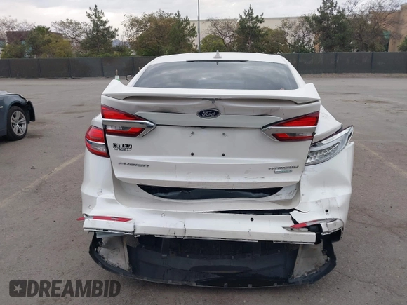 2020 Ford Fusion Titanium with VIN 3FA6P0K92LR103416, listed as a IAAI auction lot 41681810 with 54,902 mi miles and . Bid and sale history available at DreamBid. Image 16.
