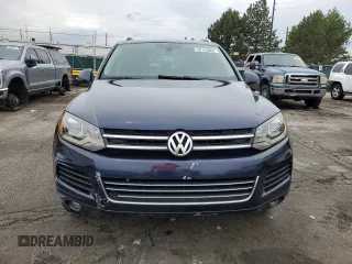 2011 Volkswagen Touareg Lux z VIN WVGFK9BP4BD001551, wystawiony jako Copart lot #58743065 z przebiegiem 142 661 mil mil oraz Szkoda całkowita • Salvage title. Historia ofert i sprzedaży dostępna na DreamBid. Obrazek 5.