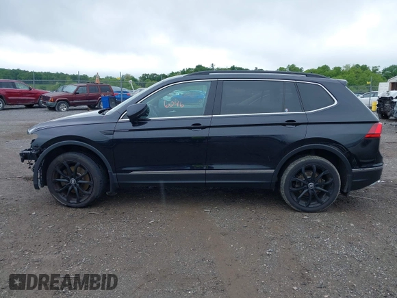 2018 Volkswagen Tiguan SEL with VIN 3VV3B7AXXJM090706, listed as a IAAI auction lot 42216046 with 147,249 mi miles and . Bid and sale history available at DreamBid. Image 14.