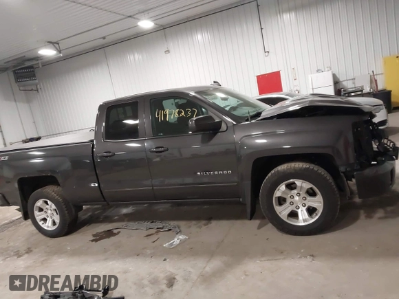 2016 Chevrolet Silverado 1500 LT with VIN 1GCVKREC0GZ303387, listed as a IAAI auction lot 41978237 with 123,692 mi miles and . Bid and sale history available at DreamBid. Image 13.