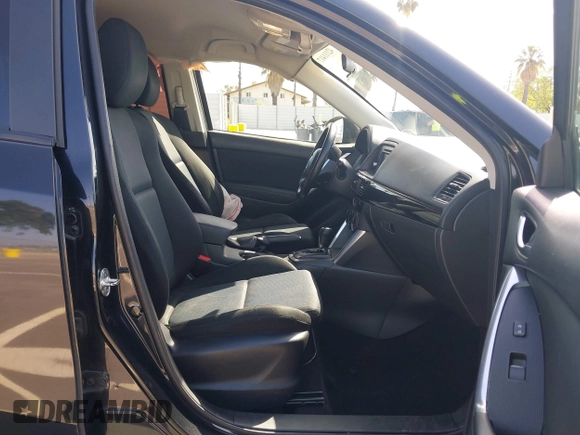 2014 Mazda CX-5 Sport z VIN JM3KE2BE8E0371775, wystawiony jako IAAI lot #42111417 z przebiegiem 150 932 mil mil oraz . Historia ofert i sprzedaży dostępna na DreamBid. Obrazek 5.