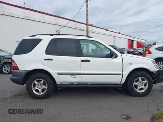 1998 Mercedes-Benz M-Class with VIN 4JGAB54E0WA005344, listed as a IAAI auction lot 37837508 with 159,933 mi miles. Bid and sale history available at carsss.com. Image 13.