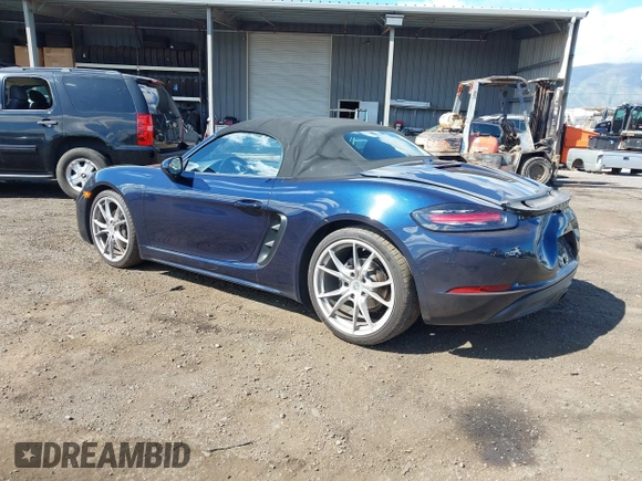 2018 Porsche 718 Boxster z VIN WP0CA2A8XJS210766, wystawiony jako IAAI lot #41617239 z przebiegiem 55 336 mil mil oraz . Historia ofert i sprzedaży dostępna na DreamBid. Obrazek 3.