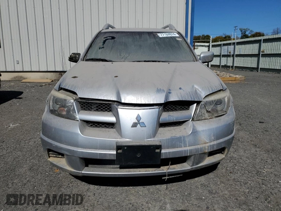 2006 Mitsubishi Outlander SE with VIN JA4LX41F66U025242, listed as a Copart auction lot 77124974 with 163,848 mi miles and Salvage Title. Bid and sale history available at carsss.com. Image 5.