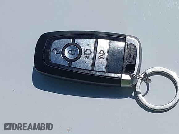 2018 Ford Fusion SE z VIN 3FA6P0LU2JR261268, wystawiony jako IAAI lot #42301578 z przebiegiem 63 357 mil mil oraz . Historia ofert i sprzedaży dostępna na DreamBid. Obrazek 11.