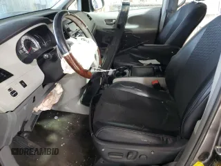 2011 Toyota Sienna SE with VIN 5TDXK3DCXBS159705, listed as a Copart auction lot 52173115 with 134,100 mi miles and Salvage Title. Bid and sale history available at carsss.com. Image 7.