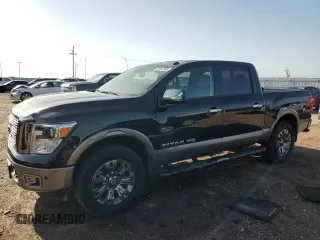 2019 Nissan Titan Platinum Reserve with VIN 1N6AA1E50KN515286, listed as a Copart auction lot 61407305 with 31,686 mi miles and Salvage title. Bid and sale history available at DreamBid. Image 1.